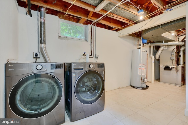 4255 Darleigh Rd, Baltimore, MD 21236 - washroom with gas water heater, washer and dryer, heating unit, and tile patterned floors
