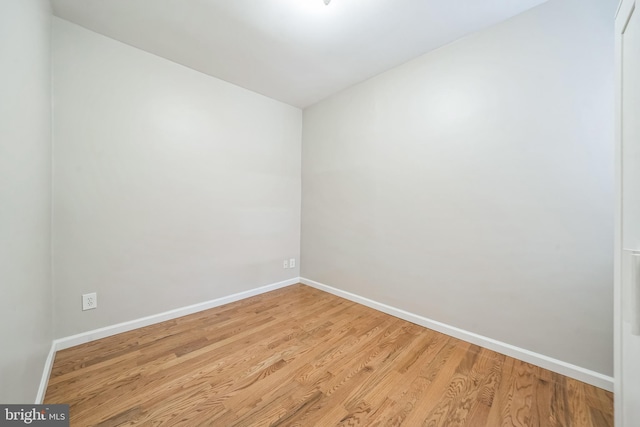 2426 S Chadwick St, Philadelphia, PA 19145 - empty room with baseboards and wood finished floors