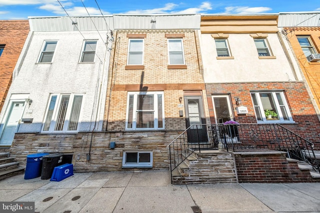2426 S Chadwick St, Philadelphia, PA 19145 - townhome / multi-family property featuring stone siding and brick siding