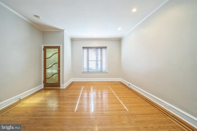 2426 S Chadwick St, Philadelphia, PA 19145 - unfurnished room featuring baseboards, ornamental molding, and wood finished floors