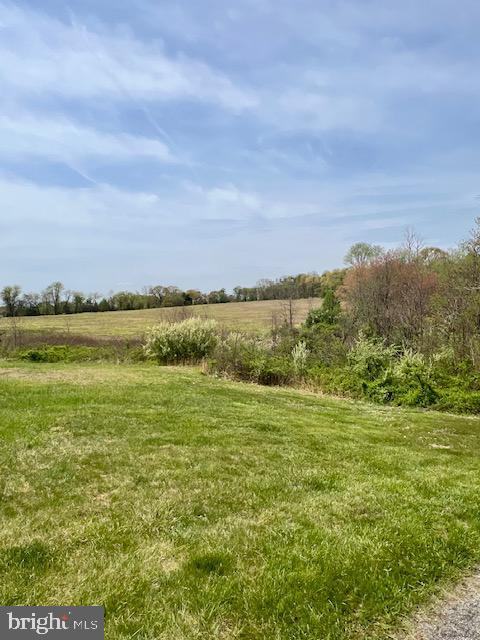 exterior space featuring a rural view