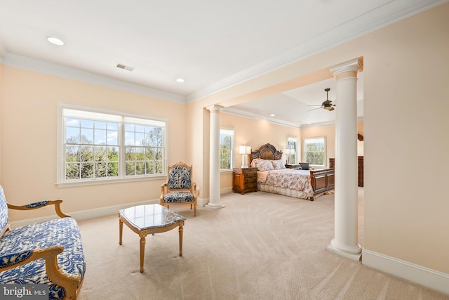 carpeted bedroom featuring baseboards, ornamental molding, ornate columns, and visible vents