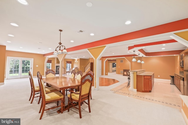 dining area featuring visible vents, recessed lighting, and light colored carpet