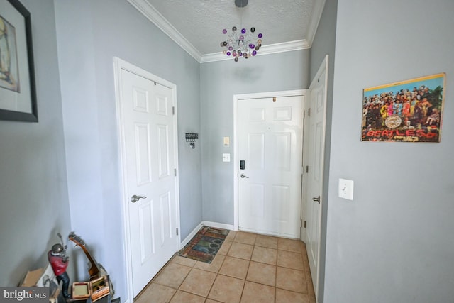4501 Talcott Ter Unit Q, Perry Hall, MD 21128 - foyer with crown molding, light tile patterned floors, baseboards, and a textured ceiling