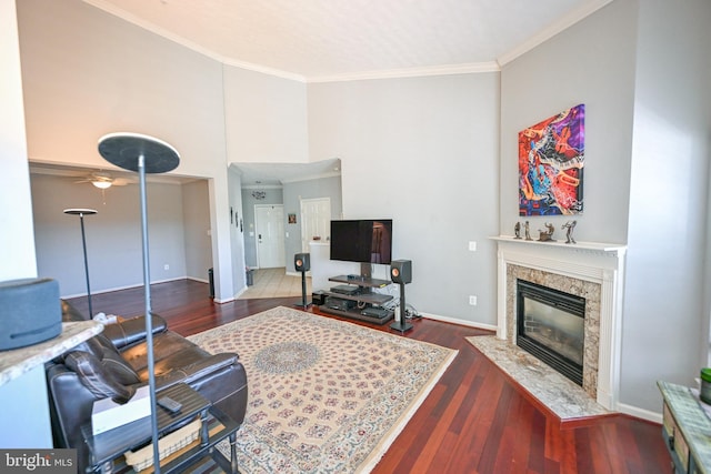 4501 Talcott Ter Unit Q, Perry Hall, MD 21128 - living area featuring crown molding, wood-type flooring, a premium fireplace, a ceiling fan, and a towering ceiling