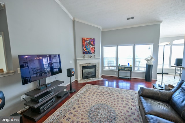 4501 Talcott Ter Unit Q, Perry Hall, MD 21128 - living room with ornamental molding, a premium fireplace, wood finished floors, and visible vents