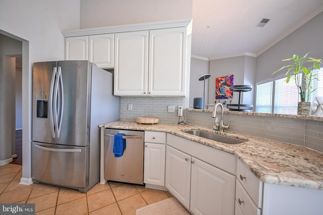 4501 Talcott Ter Unit Q, Perry Hall, MD 21128 - kitchen featuring appliances with stainless steel finishes, a sink, white cabinetry, light tile patterned floors, and tasteful backsplash