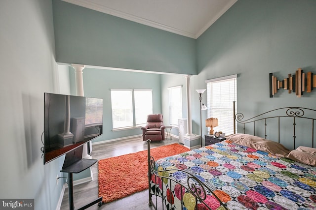 4501 Talcott Ter Unit Q, Perry Hall, MD 21128 - bedroom with ornamental molding, decorative columns, wood finished floors, and a high ceiling