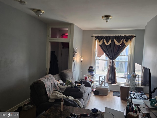 512 N Schroeder St, Baltimore, MD 21223 - living area with wood finished floors