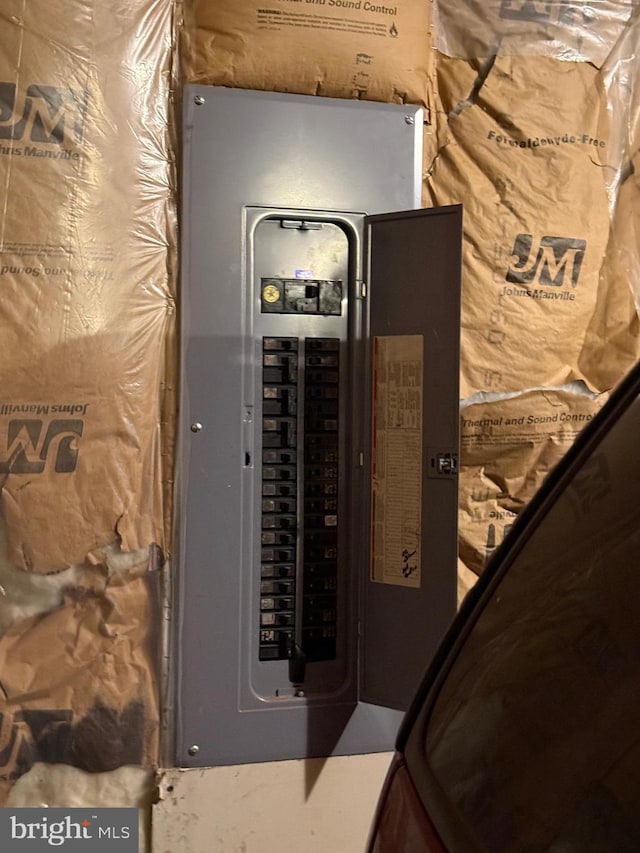 utility room featuring electric panel