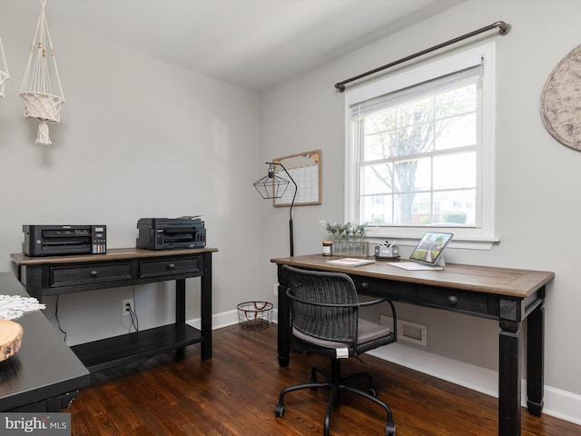 office area with baseboards and dark wood-type flooring