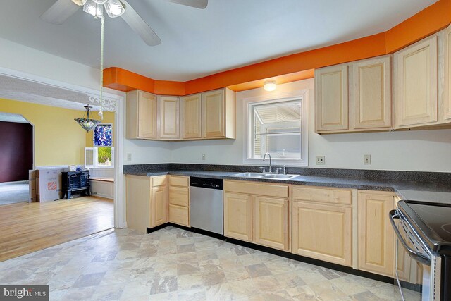 807 Riverside Dr, Pasadena, MD 21122 - kitchen featuring a sink, appliances with stainless steel finishes, light brown cabinets, and dark countertops