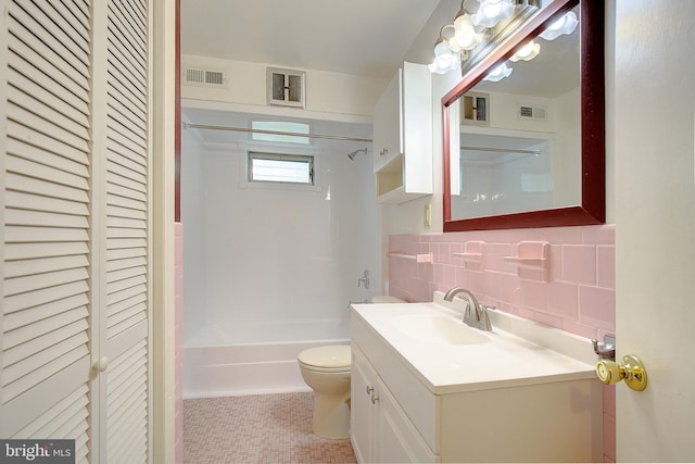 807 Riverside Dr, Pasadena, MD 21122 - full bathroom featuring a closet, toilet, shower / washtub combination, vanity, and tasteful backsplash