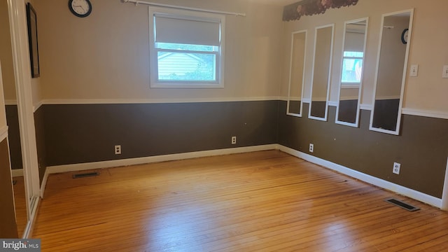 807 Riverside Dr, Pasadena, MD 21122 - spare room featuring wood-type flooring and baseboards