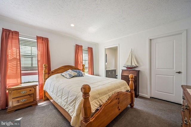 carpeted bedroom featuring baseboards, ensuite bathroom, recessed lighting, and a textured ceiling