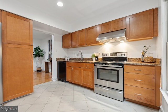 5439 Grove Ridge Way Unit 112, Rockville, MD 20852 - kitchen with electric range, under cabinet range hood, black dishwasher, dark stone counters, and brown cabinets