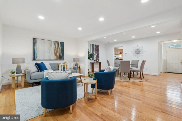 5439 Grove Ridge Way Unit 112, Rockville, MD 20852 - living room with light wood finished floors, recessed lighting, and baseboards