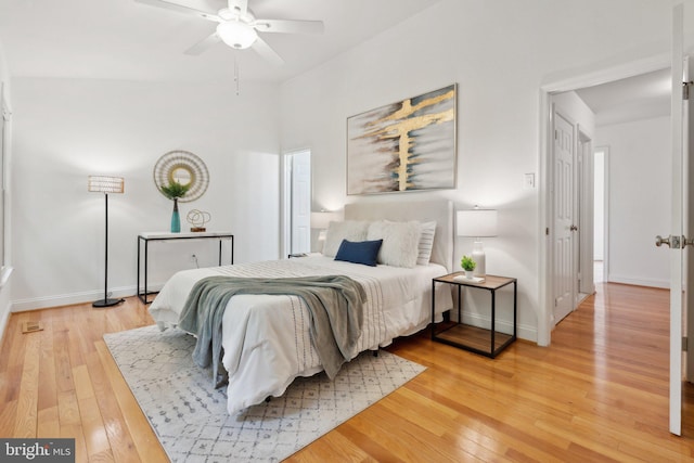 5439 Grove Ridge Way Unit 112, Rockville, MD 20852 - bedroom featuring light wood finished floors, baseboards, and ceiling fan