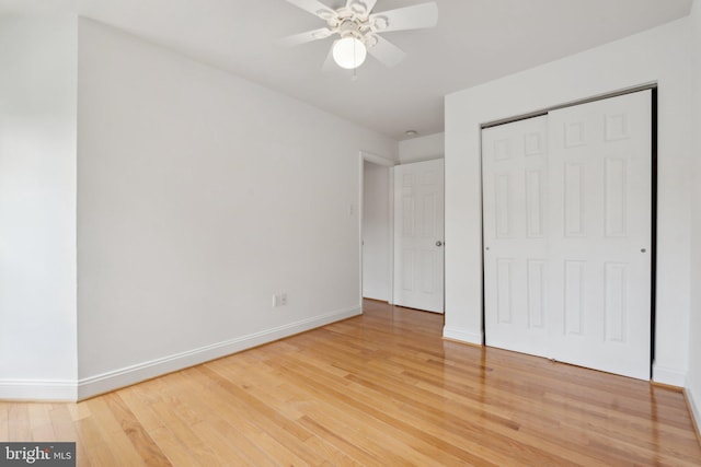 5439 Grove Ridge Way Unit 112, Rockville, MD 20852 - unfurnished bedroom with light wood-style floors, baseboards, a closet, and ceiling fan
