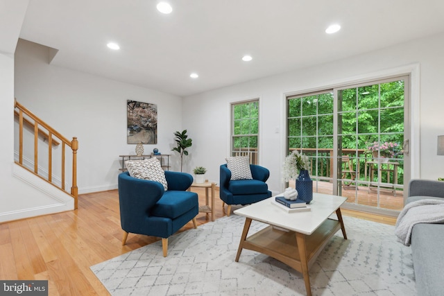 5439 Grove Ridge Way Unit 112, Rockville, MD 20852 - living area featuring stairs, wood finished floors, recessed lighting, and baseboards