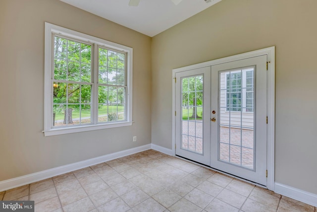 15201 Weiskopf Ct, Haymarket, VA 20169 - doorway with french doors, plenty of natural light, and baseboards