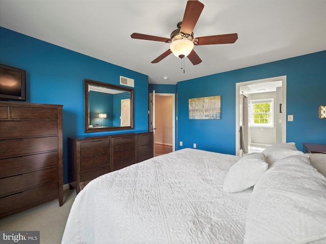 bedroom with a ceiling fan, carpet flooring, and visible vents