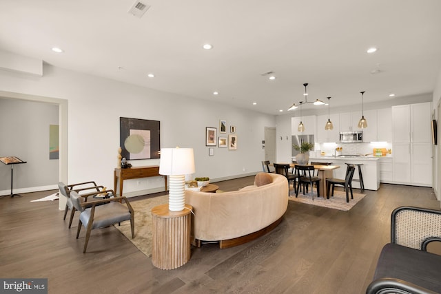 770 Park Rd NW Unit 201, Washington, DC 20010 - living room featuring recessed lighting and dark wood-type flooring
