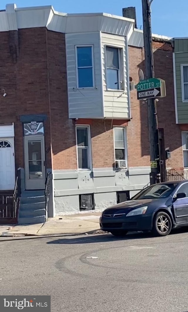 3301 Potter St, Philadelphia, PA 19134 - view of front of property with entry steps and brick siding