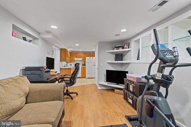 office area featuring recessed lighting, visible vents, and light wood-style floors