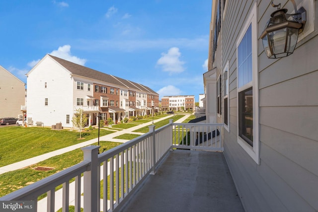 balcony featuring a residential view
