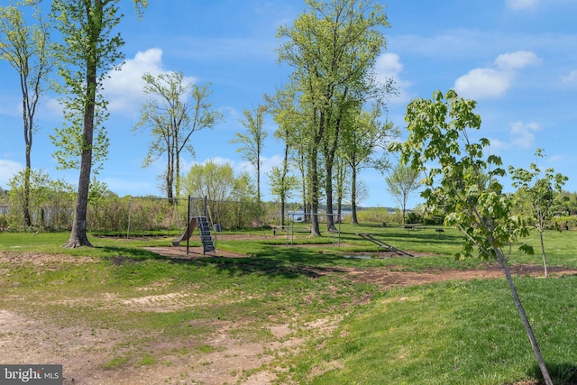 view of yard featuring playground community