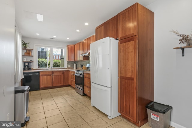 kitchen featuring open shelves, dishwasher, stainless steel gas stove, freestanding refrigerator, and under cabinet range hood