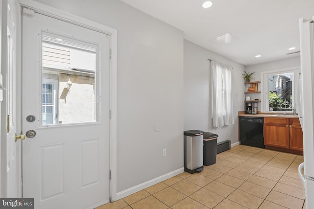 kitchen featuring brown cabinetry, open shelves, dishwasher, recessed lighting, and light tile patterned floors