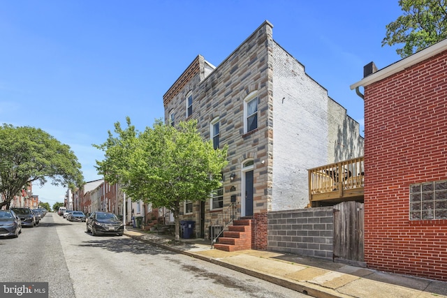 exterior space featuring sidewalks and curbs