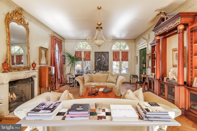 2740 Chain Bridge Rd NW, Washington, DC 20016 - living area with a lit fireplace, a notable chandelier, and plenty of natural light