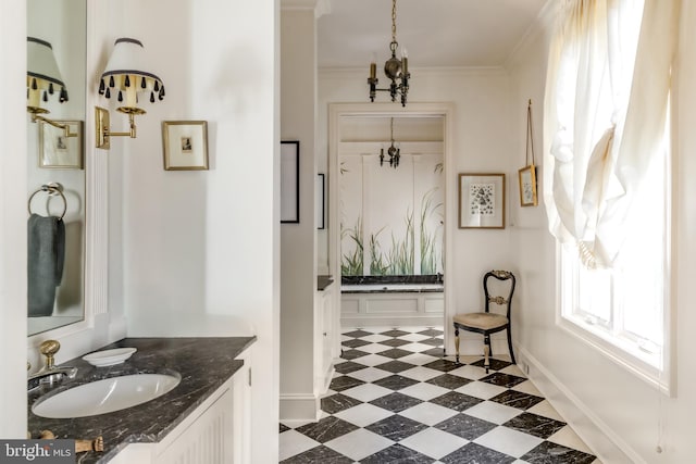 2740 Chain Bridge Rd NW, Washington, DC 20016 - bathroom featuring tile patterned floors, baseboards, vanity, and crown molding