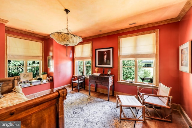 2740 Chain Bridge Rd NW, Washington, DC 20016 - sitting room featuring crown molding, baseboards, visible vents, and wood finished floors