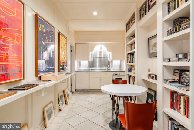 2740 Chain Bridge Rd NW, Washington, DC 20016 - kitchen featuring light tile patterned floors, white oven, stainless steel counters, open shelves, and white cabinets