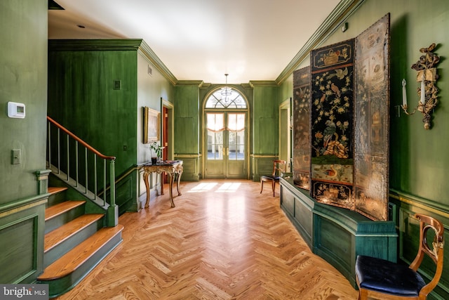 2740 Chain Bridge Rd NW, Washington, DC 20016 - sitting room with french doors, wainscoting, a decorative wall, crown molding, and stairway