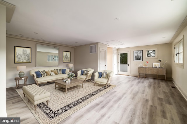 2740 Chain Bridge Rd NW, Washington, DC 20016 - living room featuring ornamental molding, visible vents, attic access, and wood finished floors