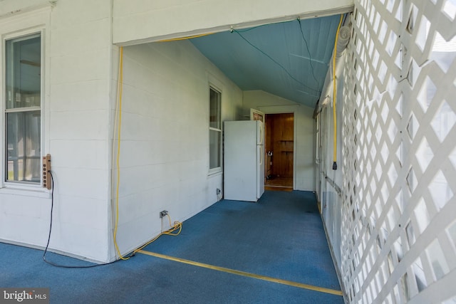 property entrance with concrete block siding
