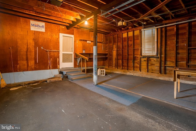 basement with wood walls