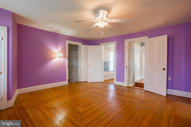 unfurnished bedroom with baseboards and ceiling fan