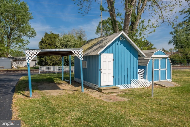 view of shed with entry steps and a detached carport