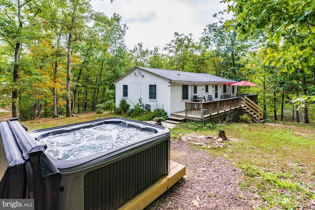 371 Oak Hill Rd, Berkeley Springs, WV 25411 - rear view of property featuring a hot tub and a deck