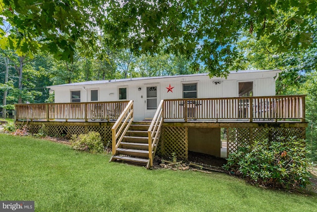 371 Oak Hill Rd, Berkeley Springs, WV 25411 - back of house featuring a lawn and a deck