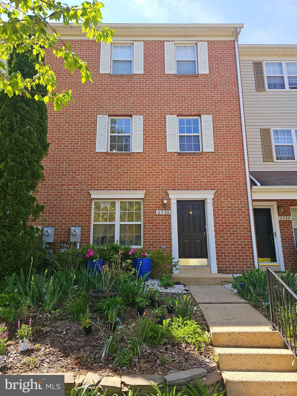 multi unit property with brick siding