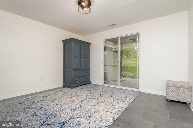 6126 Quiet Times, Columbia, MD 21045 - empty room with baseboards and tile patterned floors