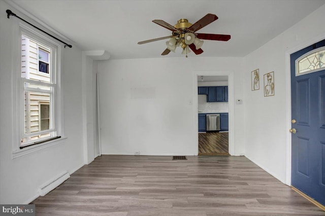 125 Cottage St, Waynesboro, PA 17268 - spare room with a ceiling fan, healthy amount of natural light, and wood finished floors