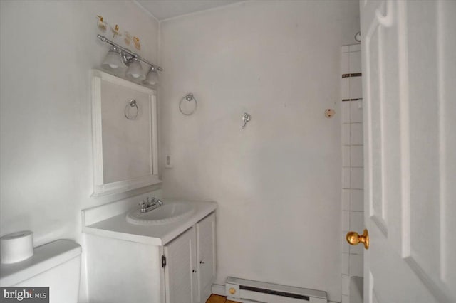 125 Cottage St, Waynesboro, PA 17268 - bathroom with a baseboard radiator, vanity, and toilet